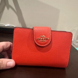 NWT Coach wallet - mango